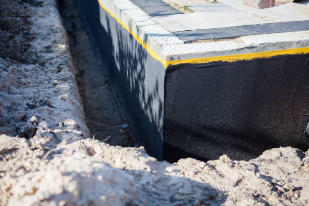 Professional Waterproofing technician working in Ocoee, TN